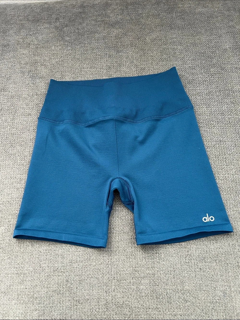 ALO Yoga Ribbed High-Rise Bike Shorts in Teal Blue